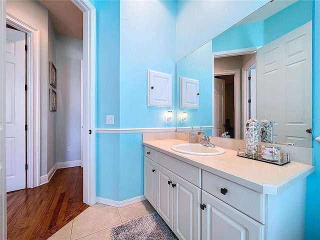 bathroom featuring vanity and tile patterned flooring