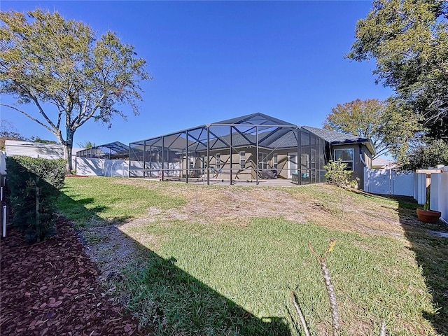 view of yard with a lanai