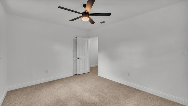 unfurnished room featuring carpet flooring and ceiling fan