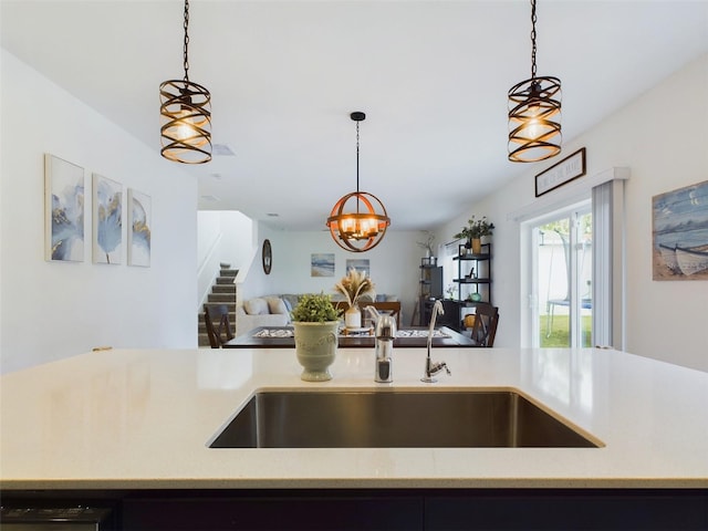 kitchen with hanging light fixtures and sink