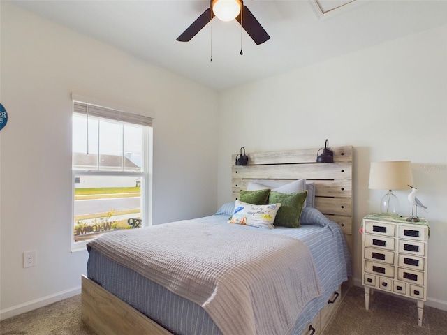 bedroom with ceiling fan and carpet floors