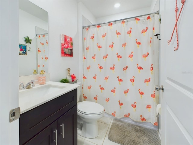 bathroom featuring a shower with curtain, vanity, toilet, and tile patterned floors