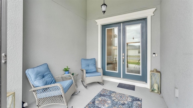 entrance to property featuring french doors