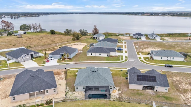 drone / aerial view with a water view