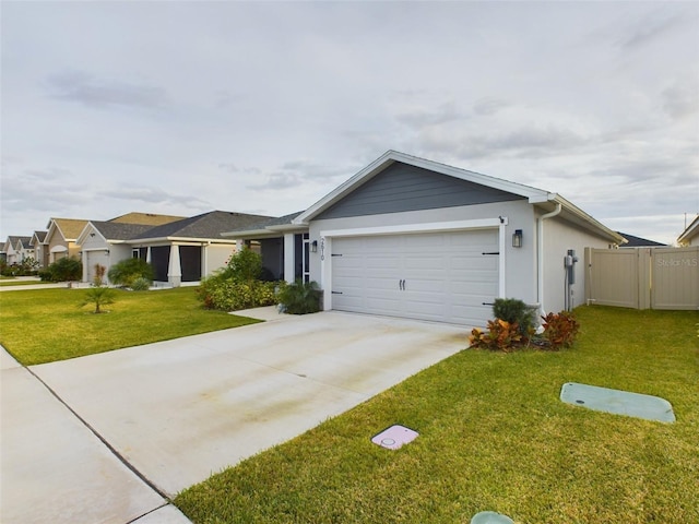 ranch-style home featuring a garage and a front lawn