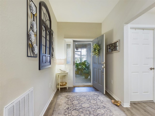 entrance foyer with light wood-type flooring