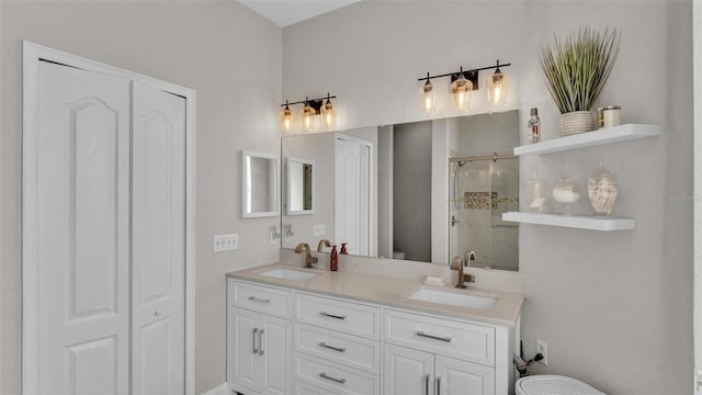 bathroom featuring vanity, toilet, and walk in shower