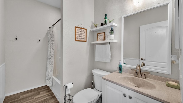 full bathroom featuring vanity, hardwood / wood-style floors, toilet, and shower / bathtub combination with curtain