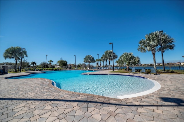 view of pool featuring a patio area