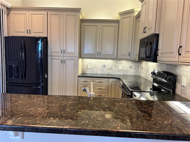 kitchen featuring tasteful backsplash, dark stone countertops, and black appliances