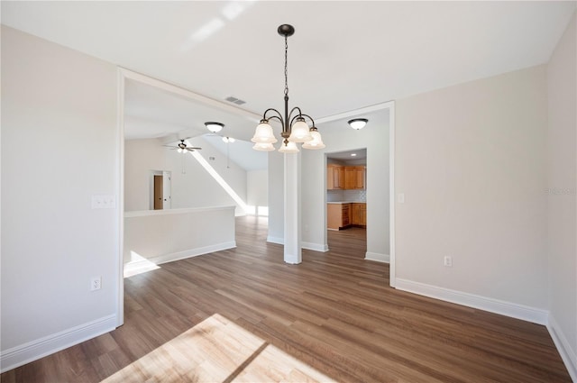 unfurnished dining area with ceiling fan and hardwood / wood-style floors