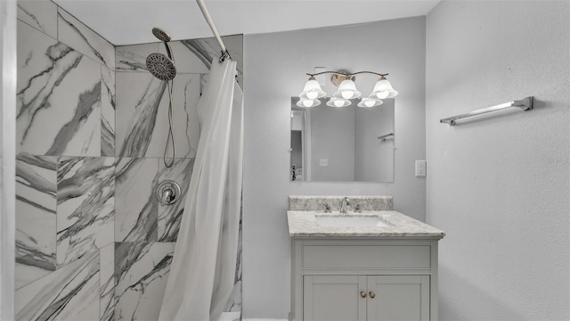 bathroom with vanity and walk in shower