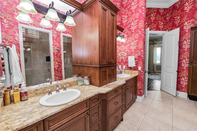 bathroom featuring vanity, tile patterned floors, and a shower with door