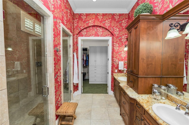 bathroom with vanity, crown molding, tile patterned floors, and separate shower and tub