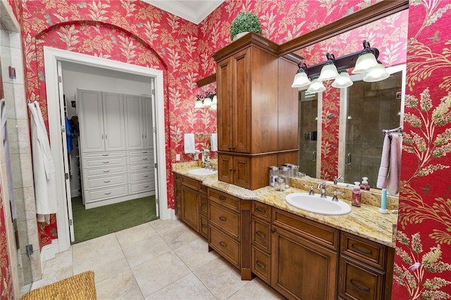 bathroom featuring walk in shower, tile patterned floors, and vanity