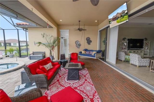 view of patio featuring an outdoor hangout area, an in ground hot tub, ceiling fan, and glass enclosure