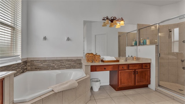 bathroom featuring tile patterned flooring, vanity, and independent shower and bath