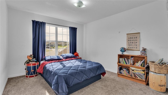 bedroom featuring carpet flooring