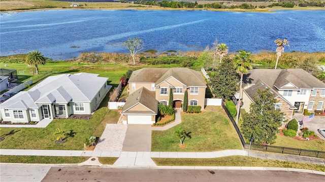 drone / aerial view with a water view