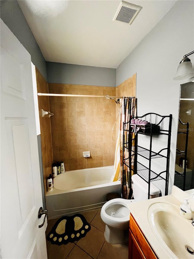 full bathroom featuring vanity, tile patterned flooring, toilet, and shower / bath combo with shower curtain