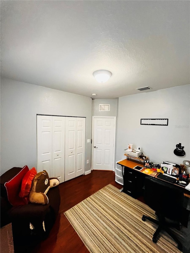 office area with hardwood / wood-style floors