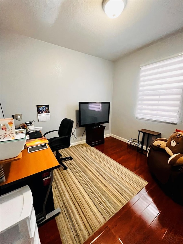 office area with dark wood-type flooring