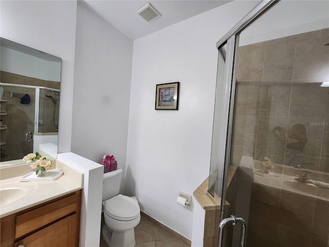 bathroom with visible vents, toilet, tile patterned flooring, vanity, and a shower stall