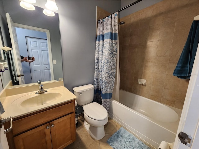 full bath with shower / bath combination with curtain, tile patterned flooring, vanity, and toilet