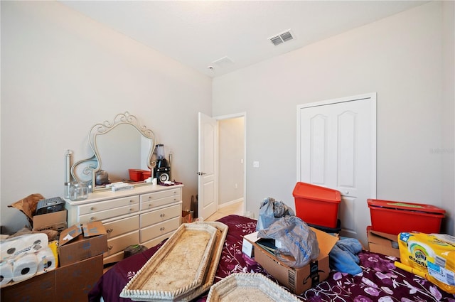 bedroom featuring visible vents