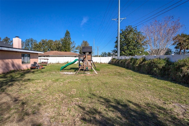 view of yard featuring a playground