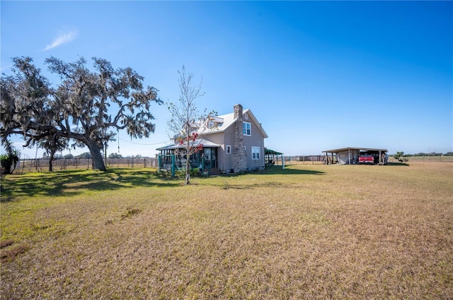 view of yard with a carport