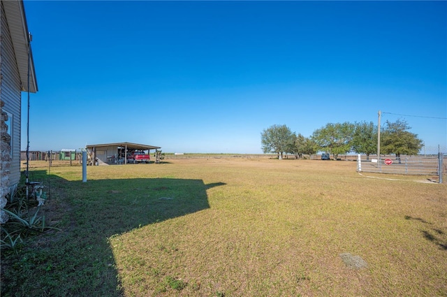 view of yard featuring a carport