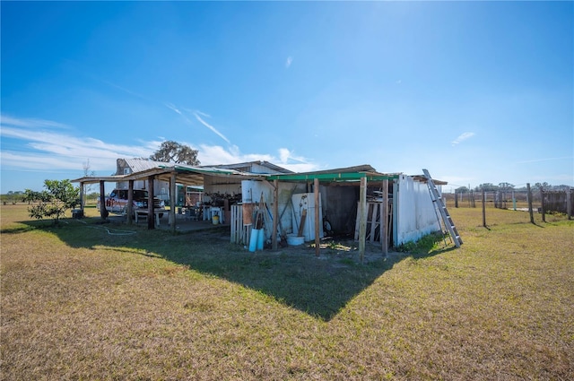 view of outdoor structure with a lawn