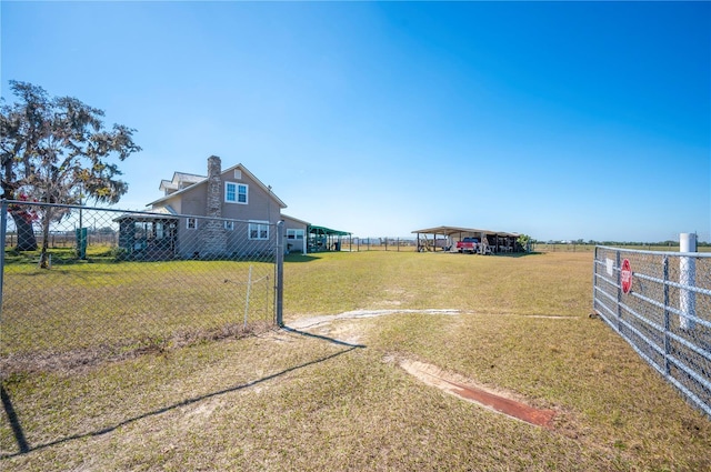 view of yard featuring a carport