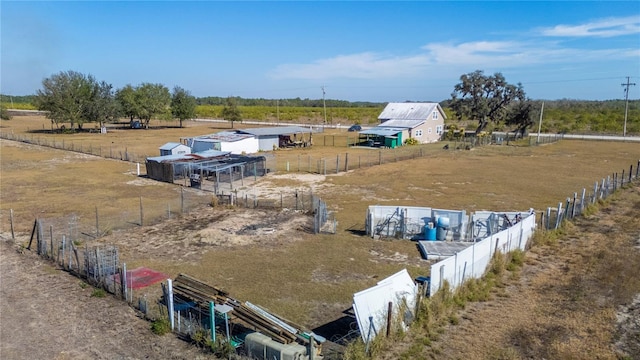 birds eye view of property featuring a rural view