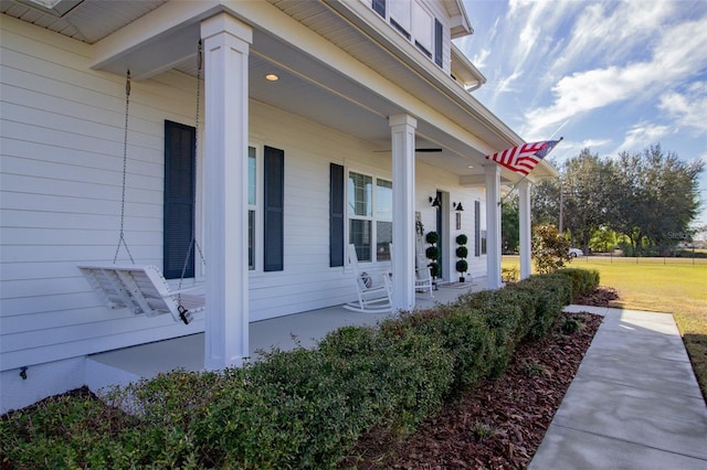 property entrance featuring covered porch