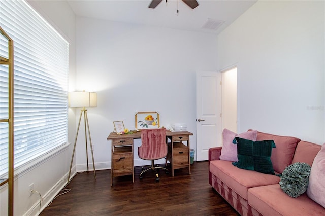 home office featuring dark wood-type flooring and ceiling fan