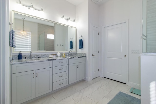 bathroom with vanity and an enclosed shower