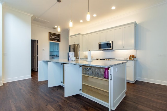 kitchen featuring light stone countertops, stainless steel appliances, white cabinets, and a center island with sink