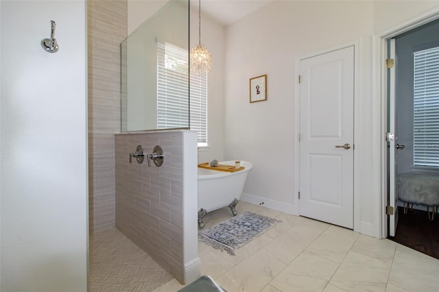 bathroom with shower with separate bathtub and a chandelier