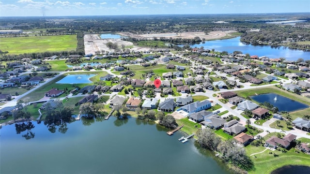 751 Meandering Way, Polk City, FL 33868 - birds eye view of property with a water view and a residential view