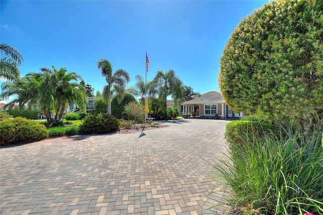751 Meandering Way, Polk City, FL 33868 - view of front of property featuring decorative driveway