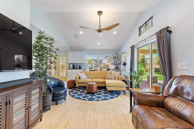 751 Meandering Way, Polk City, FL 33868 - living area featuring visible vents, light wood finished floors, a wealth of natural light, and a ceiling fan