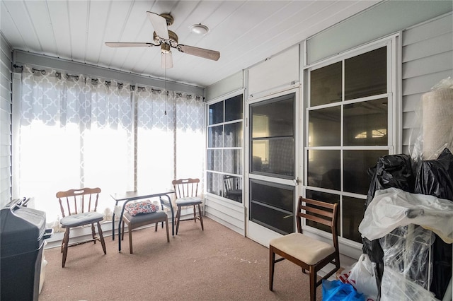 sunroom / solarium with ceiling fan