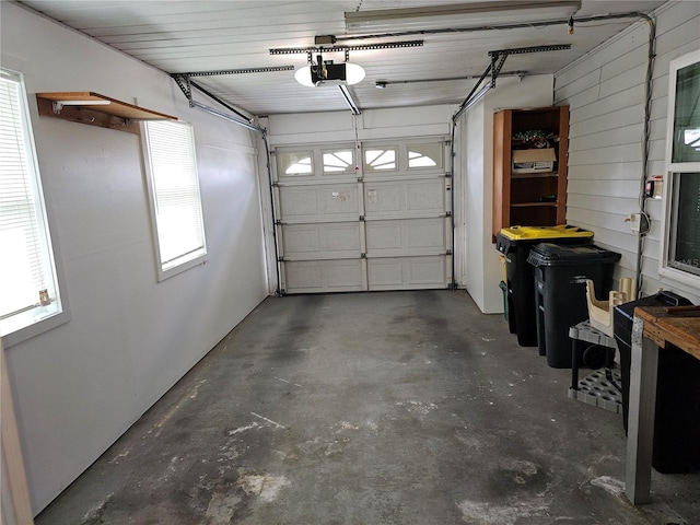 garage featuring a garage door opener