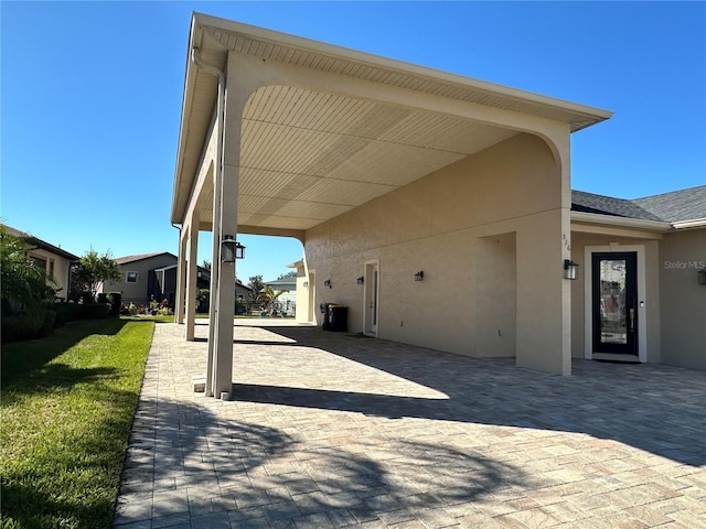 view of patio featuring a carport