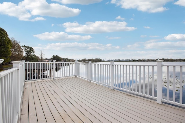 wooden terrace with a water view