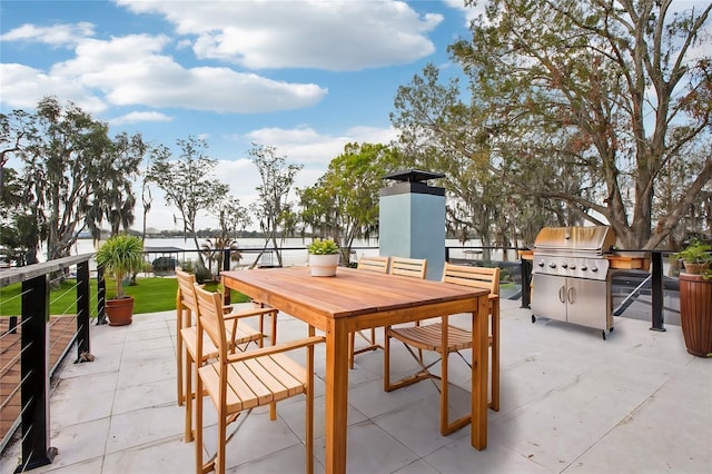 view of patio featuring outdoor dining area