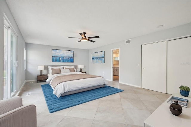 bedroom with light tile patterned floors, ceiling fan, visible vents, and baseboards