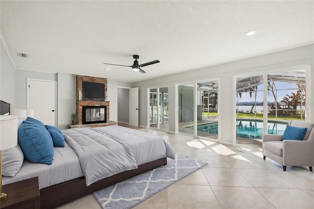 bedroom with access to outside, multiple windows, visible vents, and light tile patterned floors